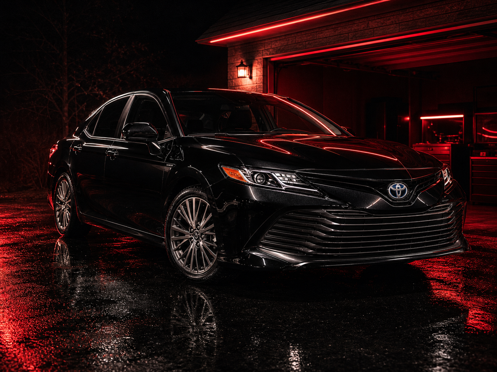 Freshly detailed Toyota Camry with clean glossy paint and visible Toyota grille badge